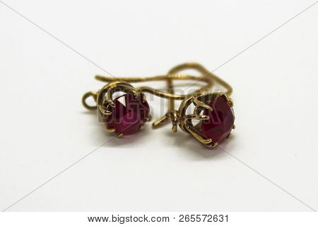 Gold Earrings With Precious Stones Isolated On White