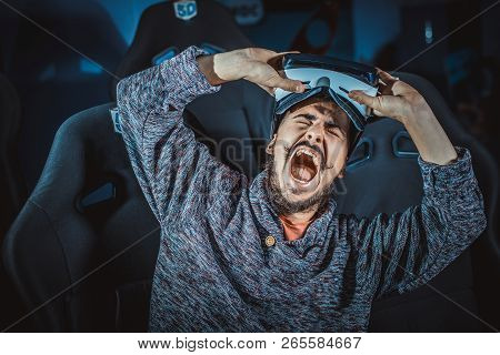Man In Virtual Glasses Is Watching A Movie In 5D In A Cinema