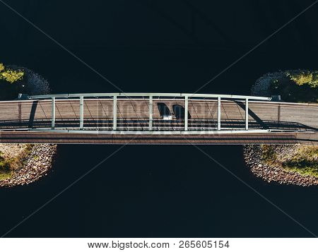 Steel Bridge Over Lake At Suomussalmi Finland On A Sunny Evening With Car Driving Over