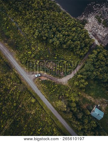 Car Leaving The House In The Forest Seen From The Sky, Lapland Finland