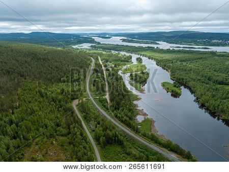 Landscape View From The Air Of River Separating Finland And Sweden And The Bridge Connecting The Two