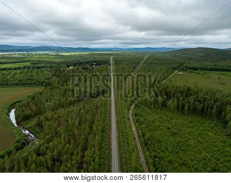 Landscape View Of Railway Track In Forest, Seen From The Sky, Northern Finland