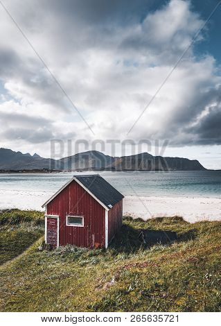 A Typical House Of The Fishermen Called Rorbu On The Beach Frames The Sea At Ramberg Lofoten Islands