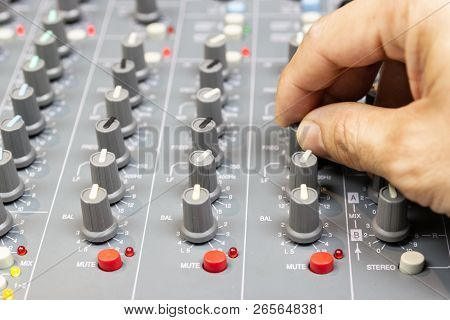 Close-up Hand Of Man Control Mixing Console Of A Big Hifi System The Audio Equipment, Control Panel 