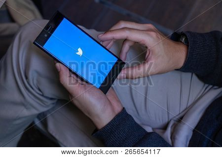 Chiang Mai, Thailand - Feb 13,2018: Man Holding Sony Xperia Xzs Mobile Phone With Twitter Logo On Th