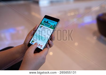Chiang Mai, Thailand - August 03,2018: Woman Holding Huawei With Google Maps On The Screen.google Ma