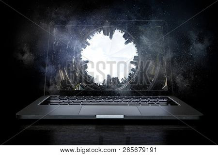 Laptop and construction concept. Mixed media