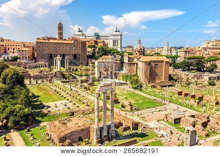 Summer Photo Of The Roman Forum: The Temple Of Castor And Pollux, The Arch Of Septimius Severus, The