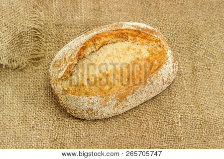 Whole Oval Loaf Of The Brown Wheat And Rye Bread With Added Whole Sprouted Wheat Grains, Rye Leaven,