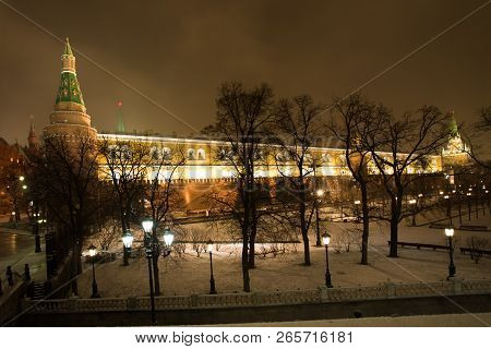 Moscow, Russia. Beautiful View From Manezh Square On Moscow Kremlin With Illuminations Lamps And Tre