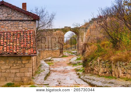 Cave City Of Chufut-kale In Crimea, View Of The Arch And The Road