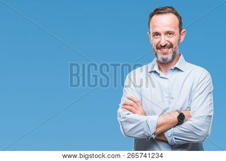Middle age hoary senior business man over isolated background happy face smiling with crossed arms looking at the camera. Positive person.