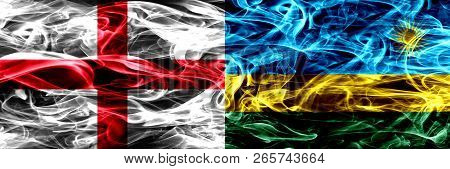 England Vs Rwanda, Rwandan Smoke Flags Placed Side By Side. Thick Colored Silky Smoke Flags Of Engli