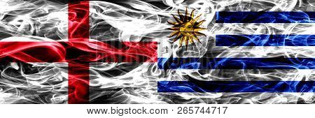 England Vs Uruguay, Uruguayan Smoke Flags Placed Side By Side. Thick Colored Silky Smoke Flags Of En