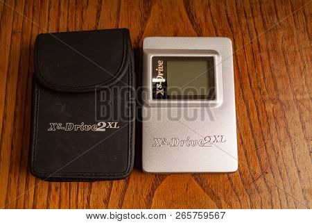 2000s Early Mp3 Music And Card Reader. Kitchen Wood Table Inside A Private Apartment. Italy Europe