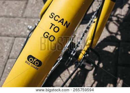 London, Uk - August 1, 2018: Close Up Of A Yellow Ofo Bike On A Street In London. Ofo Is A Dockless 