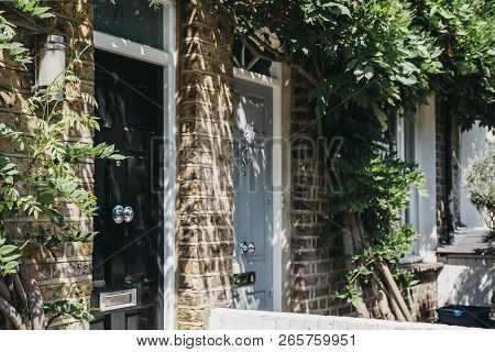 London, Uk - August 1, 2018: Close Up Of Wooden Doors Of A Traditional Victorian House In Barnes, An