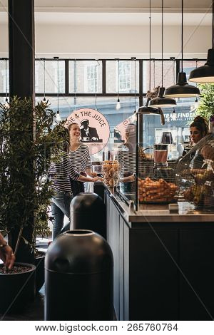 London, Uk - August 1, 2018; People Inside Joe & The Juice Cafe In Richmond, London. Joe & The Juice