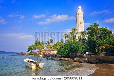 Southernmost Point In Sri Lanka, The White Lighthouse On The Shores Of The Indian Ocean