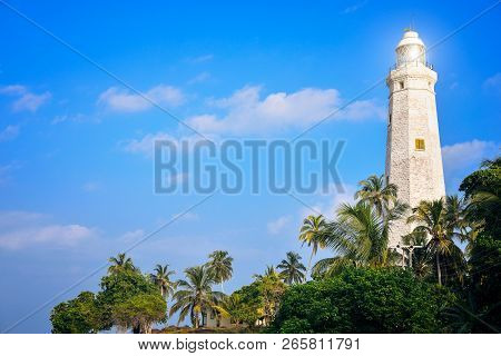 Southernmost Point In Sri Lanka, The White Lighthouse On The Shores Of The Indian Ocean