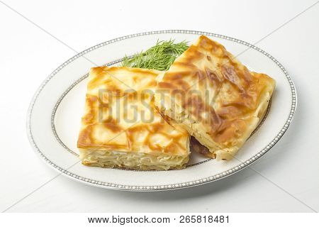 Turkish Style Meat And Cheese Stuffed Filo Dough Borek Served Su Boregi