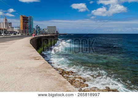 Havana, Cuba - Feb 21, 2016: Famous Seaside Drive Malecon In Havana. Skyline Of Vedado Neighborhood 
