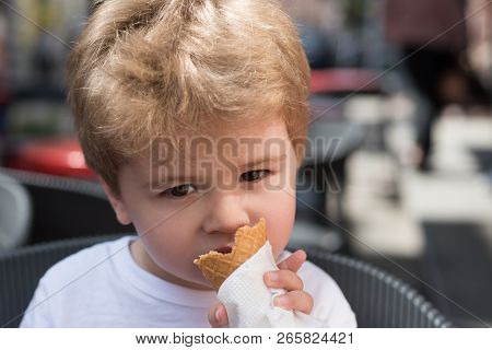 I Just Like Getting A Haircut. Small Boy With Stylish Haircut. Little Child Eating Outdoor. Little C