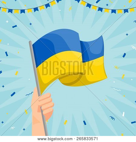 Hand Holding Ukraine Flag. Ukraine Flag In Cartoon Style. Winner Concept. Confetti Concept. Vector S