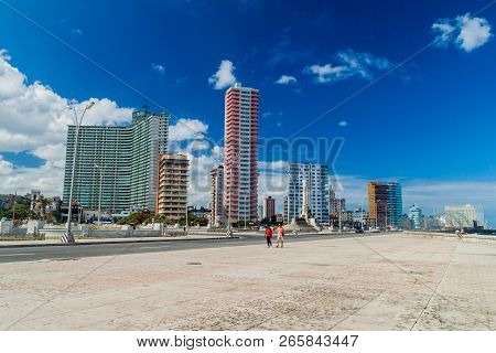 Havana, Cuba - Feb 21, 2016: Famous Seaside Drive Malecon In Havana. Skyline Of Vedado Neighborhood 