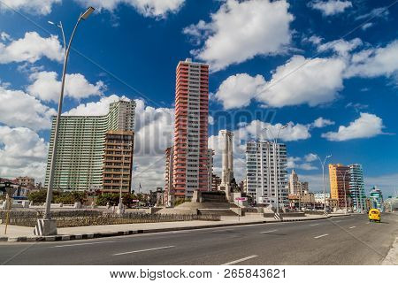 Havana, Cuba - Feb 21, 2016: Famous Seaside Drive Malecon In Havana. Skyline Of Vedado Neighborhood 