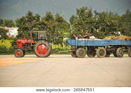 09/08/18, Hamhung, North-korea: A North Korean Propaganda Planned Economy Site With A Tractor Arrivi