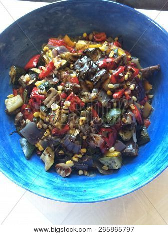 Bowl Of Colorful Roasted Vegetable Salad Mixed With Sweet Chili Souce