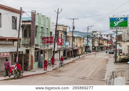 Dangriga, Belize - March 6, 2016: Local People On A Street In Dangriga Town, Belize