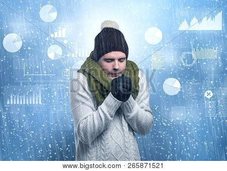 Young businessman shivering with graphs, reports and chart concept