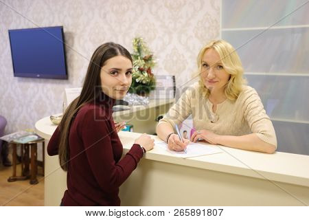 MOSOCW - JAN 10, 2018: Receptionist and patient in Razumenko dental clinic