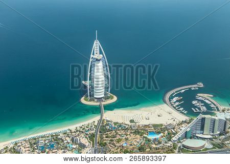 DUBAI, UAE - MAY 28: Burj Al Arab hotel on May 28, 2018 in Dubai, UAE. Burj Al Arab is a luxury unofficial 7star hotel built on an artificial island in front of Jumeirah beach. View from hydroplane.