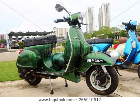Setia Alam, Selangor, Malaysia - October 14, 2018 : Elegantly Designed Green Vespa Scooter Parked In