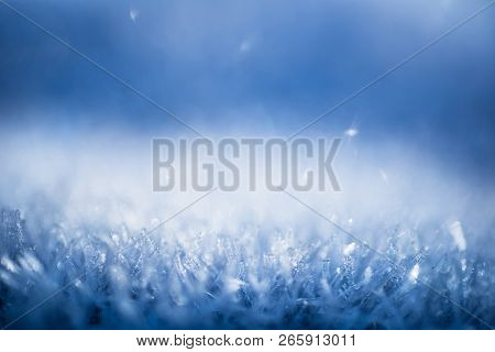 Sparkling Ice Cristals As A Background, Blue Toned Image
