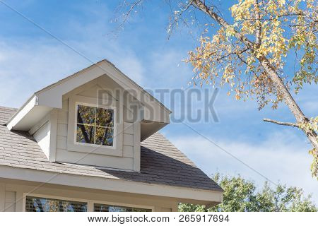 Close-up Windows On Second Story Of North American House In Fall Season