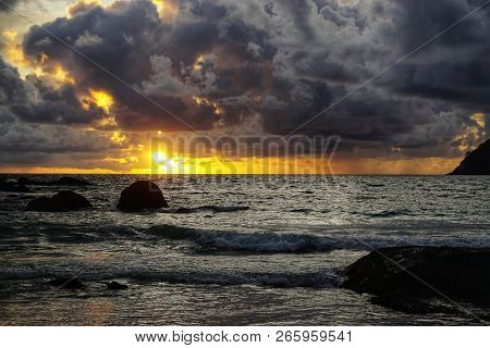 Sunset With Clouds On The Sea In Phuket, On Kata Beach