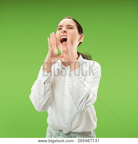 Do Not Miss. Young Casual Woman Shouting. Shout. Crying Emotional Woman Screaming On Green Studio Ba