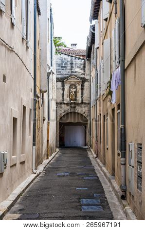Medieval Avignon Old Town Street With Arc Entrance In The End