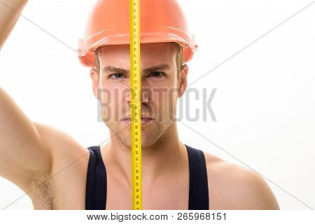 Repair, Building, Home Improvement, Interior Design Concept. Construction Builder In Hard Hat Measur