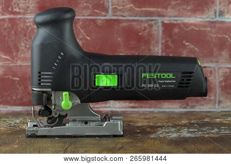 Moscow, Russia, August 15, 2018. Electric Jig Saw Festool Trion Ps 300 Eq On A Wooden Table Against 