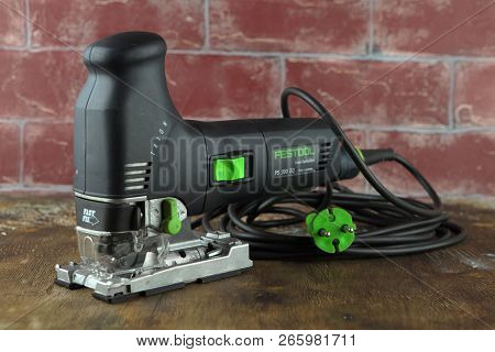 Moscow, Russia, August 15, 2018. Electric Jig Saw Festool Trion Ps 300 Eq On A Wooden Table Against 
