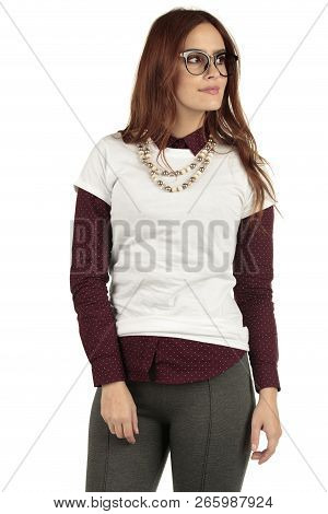 Cute Smiling Preppy, Fashion Geek Girl In A White T-shirt And Maroon Blouse