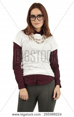 Cute Smiling Preppy, Fashion Geek Girl In A White T-shirt And Maroon Blouse