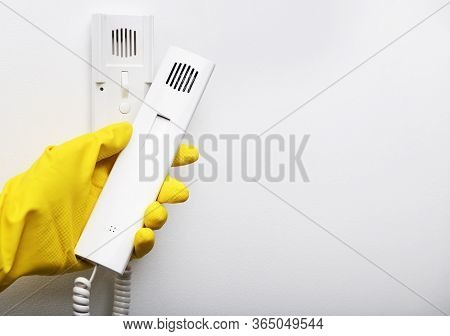 Disinfection In Public Places, The Fight Against The Virus, Coronavirus. The Working Hand Holds The 