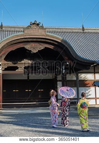 Kyoto / Japan - November 12, 2017: Girls In Traditional Japanese Kimonos At Shogun Residence Of Nijo