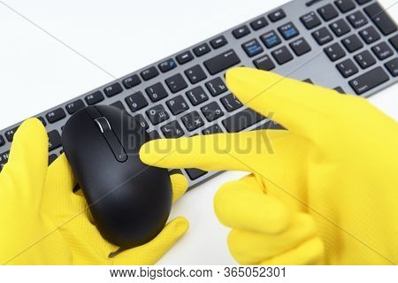 Disinfection In Public Places, The Fight Against The Virus, Coronavirus. A Rubber-gloved Working Han